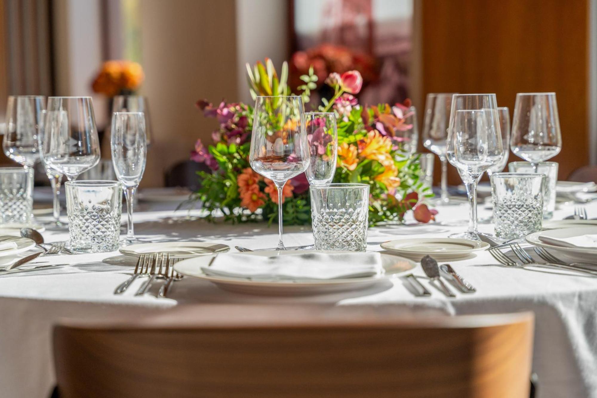 Hotel Melia Bilbao Exterior photo A table set for a formal dinner